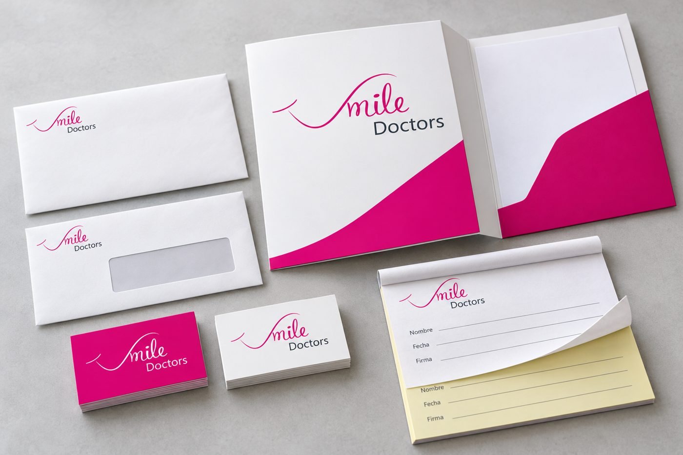 Papelería corporativa Smile Doctors: carpeta, sobres, tarjetas de visita y talonario autocopiativo